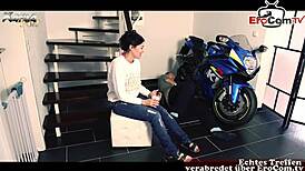 deutsche milf with tattoo bangs near motorcycle