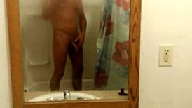 Girl plays innocently in the bath, bathing and showering without any adult themes.