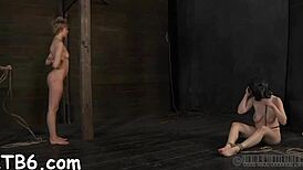 These sexy slaves strip down in a tiny cage, so hot! 😍