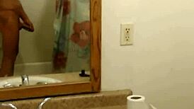 Girl plays innocently in the bath, bathing and showering without any adult themes.