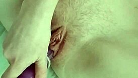 alisha dane enjoys a handjob session with her favorite toys