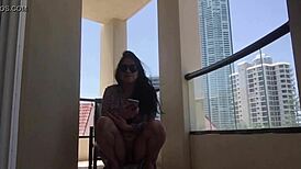 this ladyboy dances on the balcony with big tits