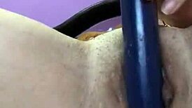 Shaved Babe Inserts Vibrator In Bedroom