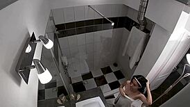 Hidden cam catches wild threesome in steamy shower!