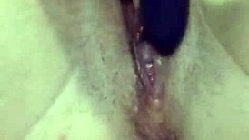 Shaved Babe Inserts Vibrator In Bedroom