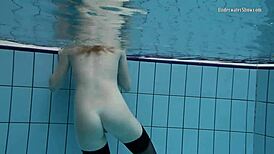 Swimming pool teen Anetta undresses for fun