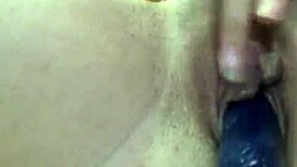 Shaved Babe Inserts Vibrator In Bedroom