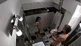 Hidden cam catches wild threesome in steamy shower!