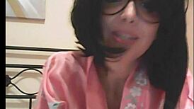 Close-up of brunette engaging in dirty talk while naked