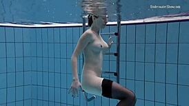 Swimming pool teen Anetta undresses for fun