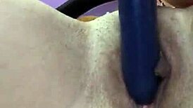 Shaved Babe Inserts Vibrator In Bedroom