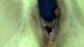 Shaved Babe Inserts Vibrator In Bedroom