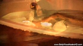 Seductive brunette teases with erotic dance and striptease