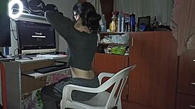 laura handles work on home computer while distracted