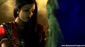 Teasing nude brunette dances erotically in oriental setting