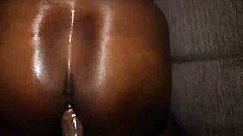 The slutty kitty bent over for doggystyle with a big black cock.