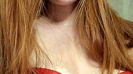 redhead lights up a cigarette and smokes