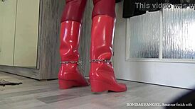 Red Leather Hooded Wife CHAINED and CUFFED!