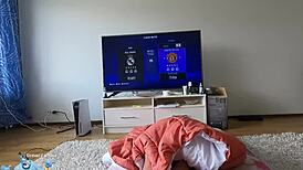 blonde babe playfully sucks small 18+ cock while he plays fifa