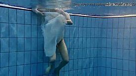 Andrea floats in the pool, showing her hottest ass underwater. 😍