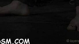 Tough Hottie Endures Suggestive Caning And Blowjob In Bondage