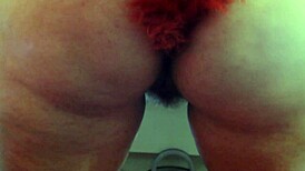 Get up close with this curvy MILF's big pussy lips as she plays with an anal plug, showing her beaver and ass