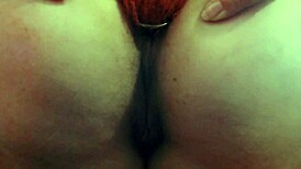 Get up close with this curvy MILF's big pussy lips as she plays with an anal plug, showing her beaver and ass