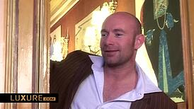 Vanessa Goldi explores the swinger castle with friends, enjoying group activities and intimate touches.