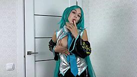 Watch her pussy get fucked in vocaloid cosplay, bent over and cowgirling rough before a creampie cumshot.
