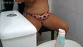 the naughty girl watches a dirty video on her phone