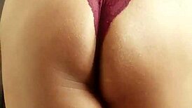 The transvestite models her outfit in the studio.