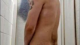 Young Hairy Guy Relaxes In Shower