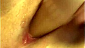 Fat woman enjoys herself with a dildo