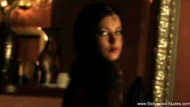 Erotic dancer in the night captivates with sensual moves and exotic allure under soft lights