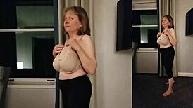 Hey, check this curvy busty granny getting fully naked for wild fun!