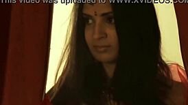 Sexy brunette babe belly dances with captivating moves