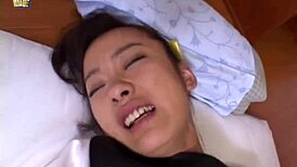 japanese teen gets wet from finger fucking in doggystyle