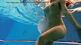 Kristy, the Hot Brunette Babe, Shows Big Boobs by the Swimming Pool Underwater in Bikini.