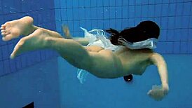 Kristy, the Hot Brunette Babe, Shows Big Boobs by the Swimming Pool Underwater in Bikini.