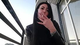 Beautiful Woman Smoking Cigarette In Fetish Video