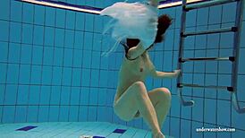 Kristy, the Hot Brunette Babe, Shows Big Boobs by the Swimming Pool Underwater in Bikini.