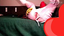 Watch this cosplay babe solo with large dildo under blacklight!