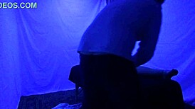 Gigi breeze receives detailed blacklight massage with fetish elements from black masseur