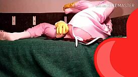 Watch this cosplay babe solo with large dildo under blacklight!