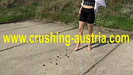 amber plays with feet and food outdoors