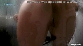 This beautiful amateur girl is masturbating in the shower