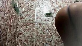 Ebony teen twerking in shower gets cumshot orgasm.