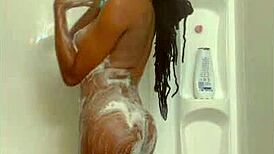 Ebony beauty bathes solo in wet sexy shower