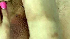 she paints her toenails and invites the neighbor for a footjob, filling her feet with his cum