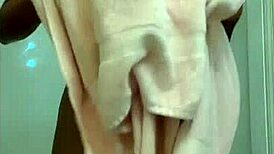 Ebony beauty bathes solo in wet sexy shower